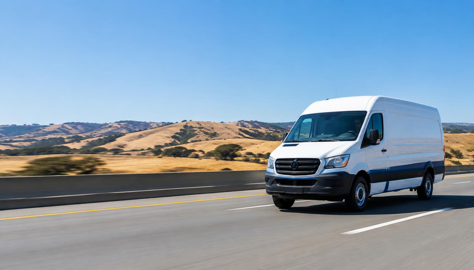 Professional courier van traveling on a California highway